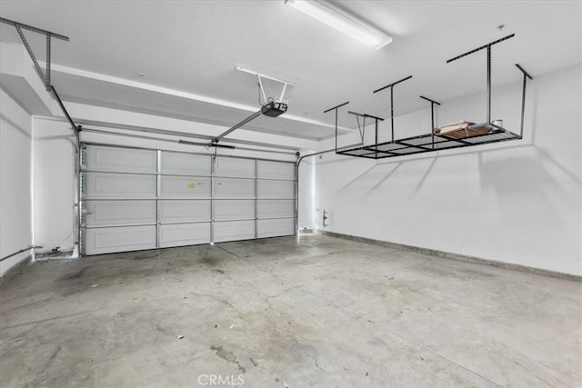 26327 Iris Ave Unit C, Moreno Valley, CA 92555 - garage featuring a garage door opener