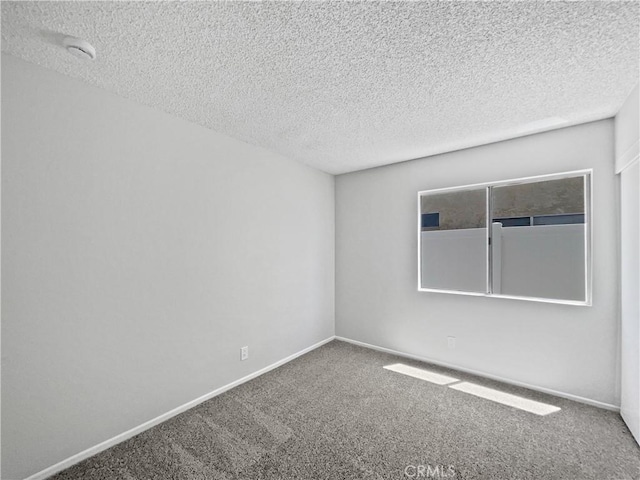 29923 Corte Cruzada, Menifee, CA 92584 - carpeted empty room with a textured ceiling and a smoke detector