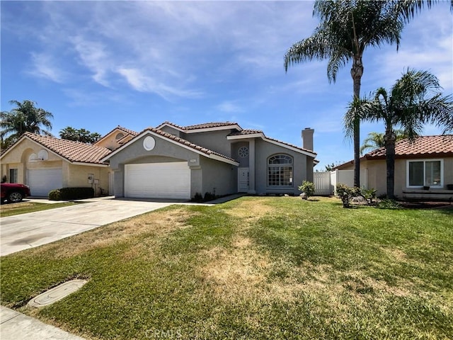 29923 Corte Cruzada, Menifee, CA 92584 - mediterranean / spanish-style house featuring stucco siding, an attached garage, driveway, and a tiled roof