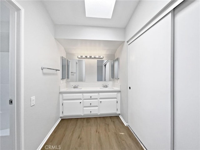 29923 Corte Cruzada, Menifee, CA 92584 - full bath with wood finished floors and double vanity