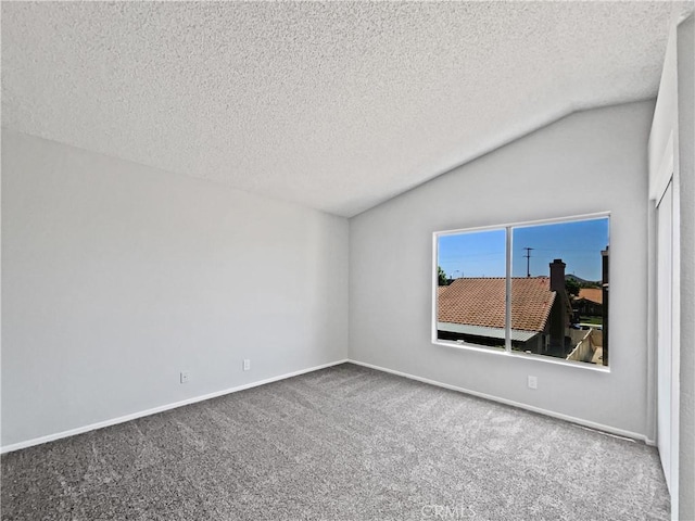 29923 Corte Cruzada, Menifee, CA 92584 - carpeted spare room with lofted ceiling and a textured ceiling