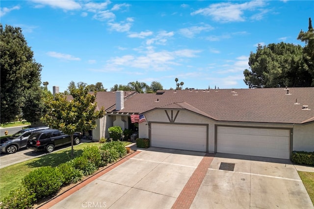 3197 Bexfield Ct, Riverside, CA 92503 - view of front of home featuring stucco siding, concrete driveway, a garage, and a shingled roof