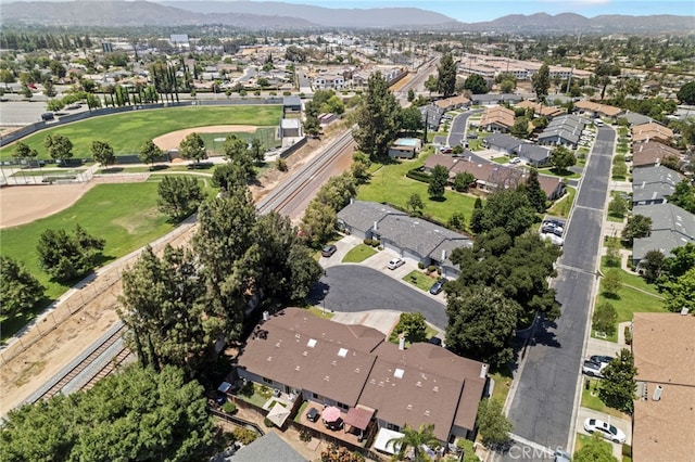 3197 Bexfield Ct, Riverside, CA 92503 - aerial overview of property's location featuring nearby suburban area and a mountain backdrop