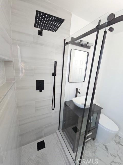 7927 Chastain Pl, Reseda, CA 91335 - bathroom featuring a stall shower and marble finish flooring