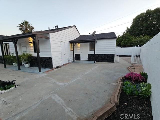 7927 Chastain Pl, Reseda, CA 91335 - back of property featuring stone siding