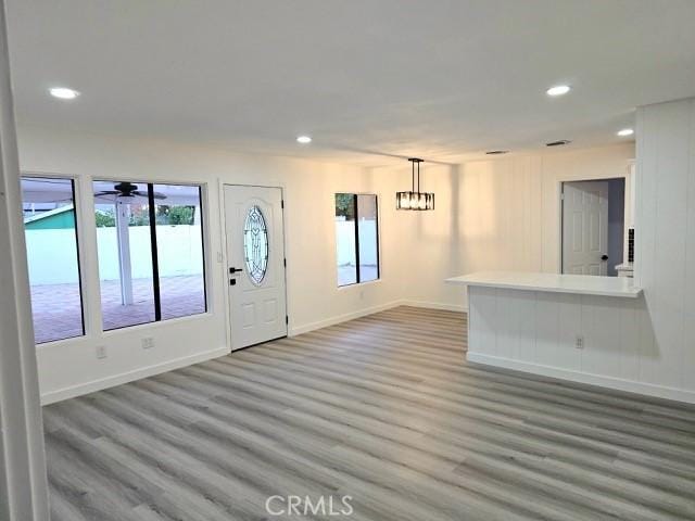 7927 Chastain Pl, Reseda, CA 91335 - foyer entrance with recessed lighting, wood finished floors, a chandelier, and a ceiling fan