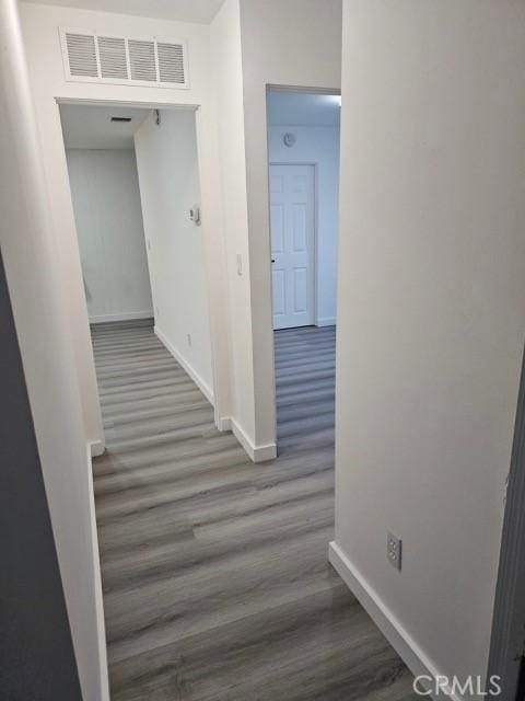 7927 Chastain Pl, Reseda, CA 91335 - corridor with wood finished floors and baseboards