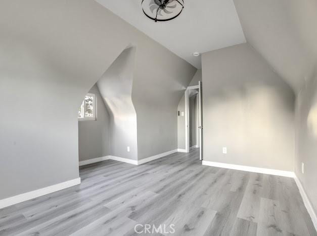 1438 W 69th St, Los Angeles, CA 90047 - additional living space with wood finished floors and lofted ceiling
