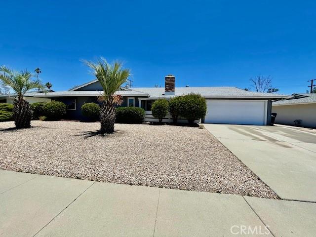 28838 Snead Dr, Menifee, CA 92586 - ranch-style home with driveway and an attached garage