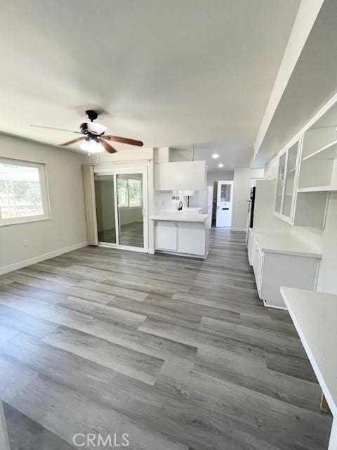 28838 Snead Dr, Menifee, CA 92586 - unfurnished living room with a ceiling fan, dark wood finished floors, and recessed lighting