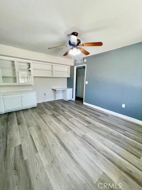 28838 Snead Dr, Menifee, CA 92586 - unfurnished living room with ceiling fan and wood finished floors