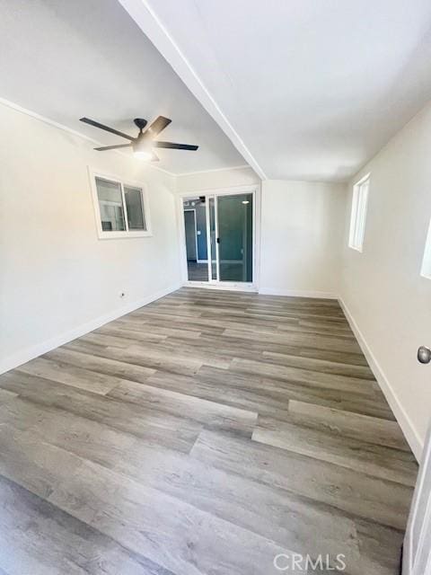 28838 Snead Dr, Menifee, CA 92586 - spare room featuring wood finished floors and ceiling fan