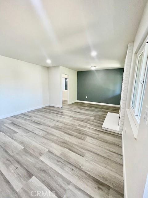 28838 Snead Dr, Menifee, CA 92586 - empty room with wood finished floors and baseboards