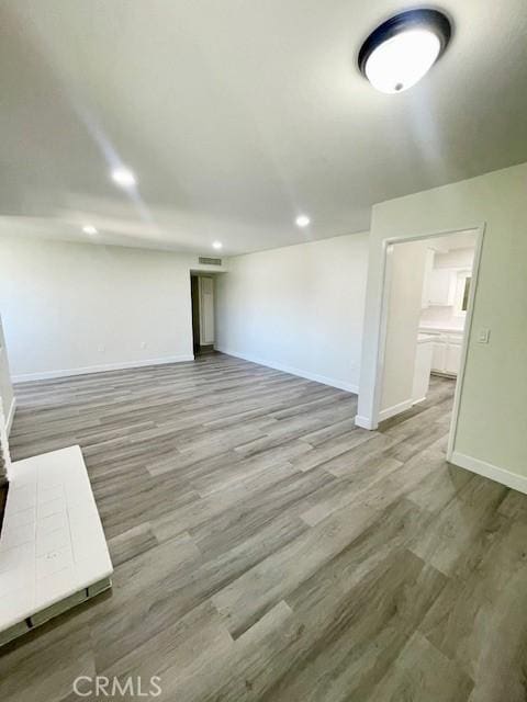 28838 Snead Dr, Menifee, CA 92586 - below grade area featuring wood finished floors and recessed lighting