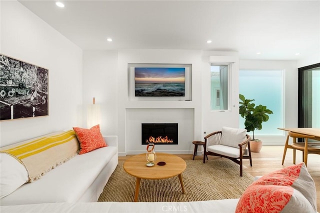 6191/2 Marguerite, Corona Del Mar, CA 92625 - living room featuring wood finished floors, recessed lighting, and a warm lit fireplace