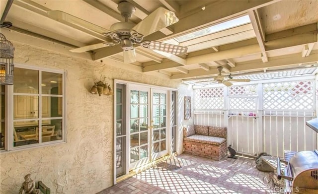 856 Ardmore Cir, Redlands, CA 92374 - unfurnished sunroom featuring a ceiling fan and beamed ceiling