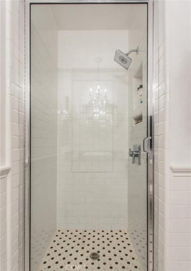 856 Ardmore Cir, Redlands, CA 92374 - full bathroom with a chandelier and a shower stall