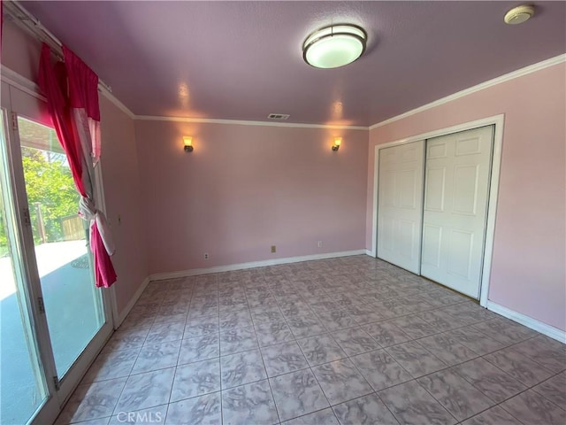 13761 Lomitas Ave, La Puente, CA 91746 - unfurnished bedroom featuring ornamental molding and a closet
