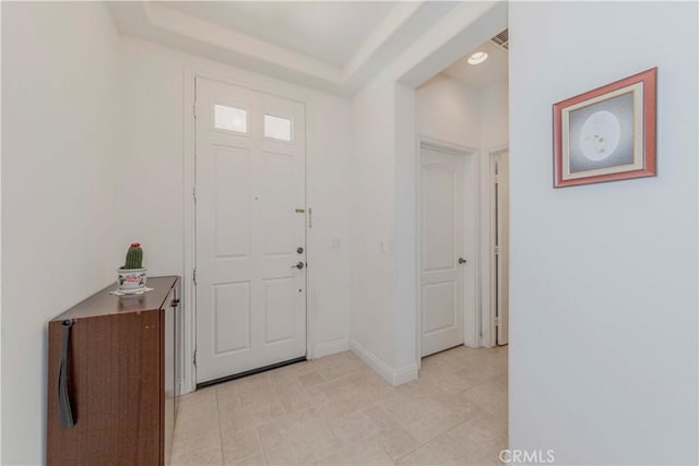 1411 W Dahlia St, La Habra, CA 90631 - foyer with light tile patterned floors and a raised ceiling