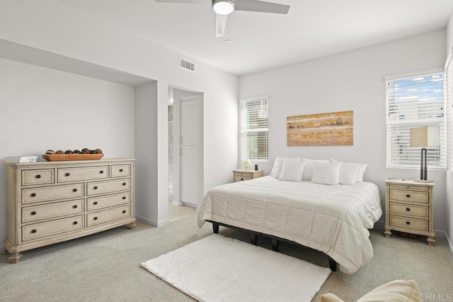 2035 Bravo Loop Unit 6, Chula Vista, CA 91915 - bedroom with light carpet, multiple windows, and a ceiling fan