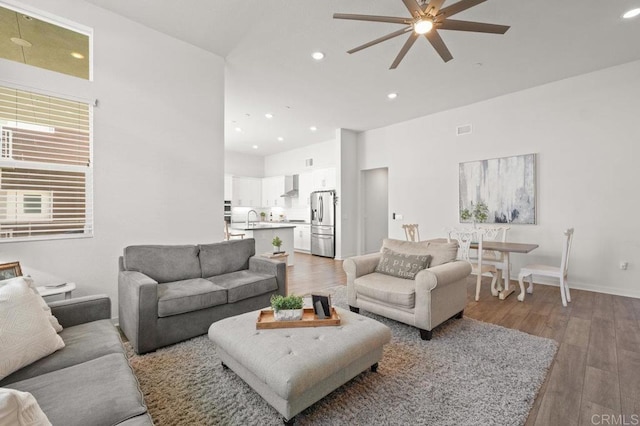 2035 Bravo Loop Unit 6, Chula Vista, CA 91915 - living room with a ceiling fan, wood finished floors, and recessed lighting