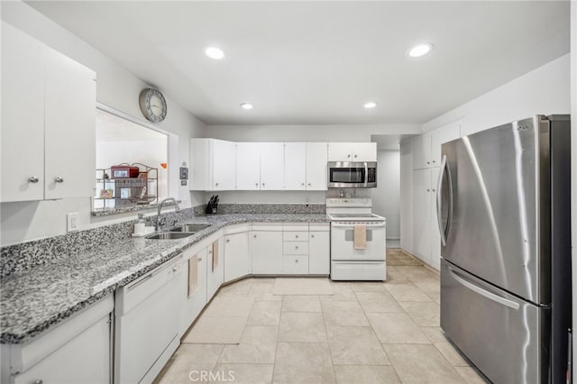 621 Shasta Way, Hemet, CA 92543 - kitchen with stainless steel appliances, white cabinetry, recessed lighting, light stone countertops, and light tile patterned flooring
