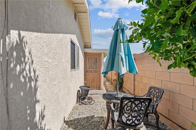 621 Shasta Way, Hemet, CA 92543 - doorway to property with stucco siding and a patio area