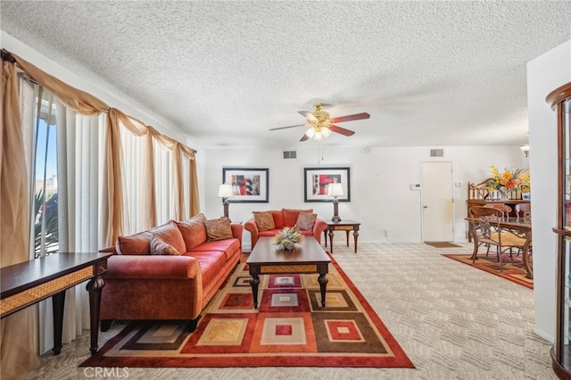 621 Shasta Way, Hemet, CA 92543 - carpeted living room with ceiling fan and a textured ceiling