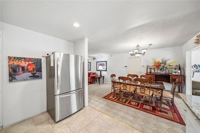 621 Shasta Way, Hemet, CA 92543 - dining area featuring a chandelier, light tile patterned floors, light carpet, and recessed lighting