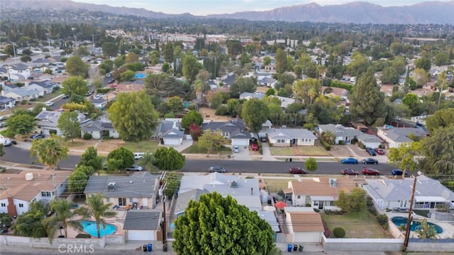 16908 Los Alimos St, Granada Hills, CA 91344 - aerial view of residential area with mountains and a pool