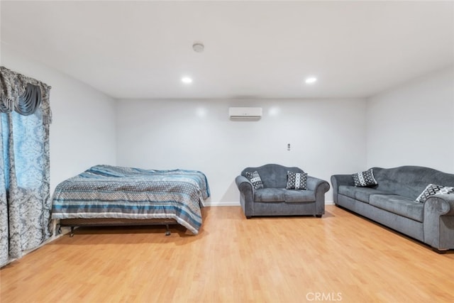 16908 Los Alimos St, Granada Hills, CA 91344 - bedroom featuring an AC wall unit, wood finished floors, and recessed lighting
