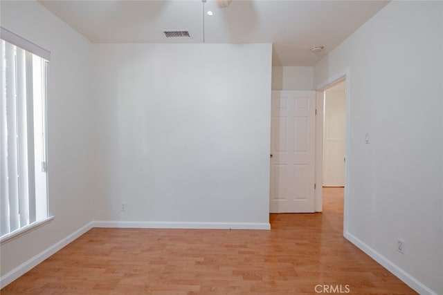 16908 Los Alimos St, Granada Hills, CA 91344 - empty room featuring light wood-style floors and a smoke detector