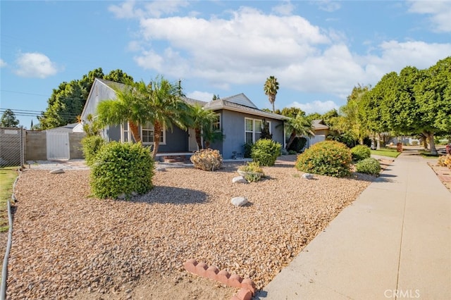 16908 Los Alimos St, Granada Hills, CA 91344 - view of front facade with stucco siding and a gate