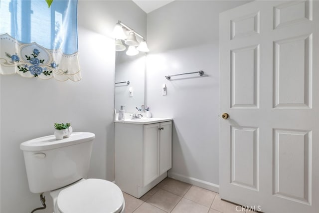 16908 Los Alimos St, Granada Hills, CA 91344 - half bathroom with vanity and tile patterned floors