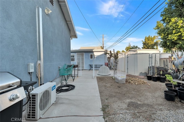 16908 Los Alimos St, Granada Hills, CA 91344 - view of patio with a grill and a gate