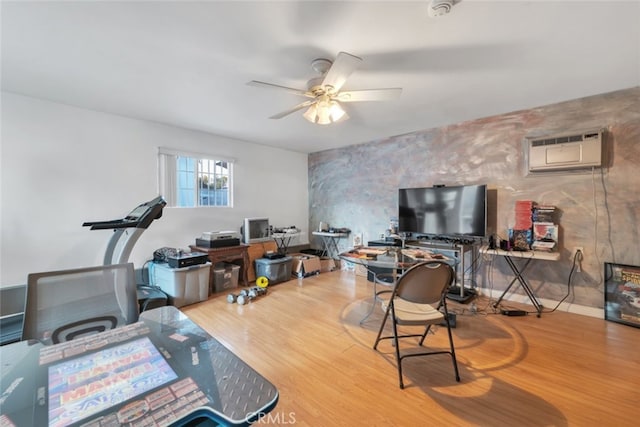 16908 Los Alimos St, Granada Hills, CA 91344 - home office featuring a wall unit AC, ceiling fan, and wood finished floors