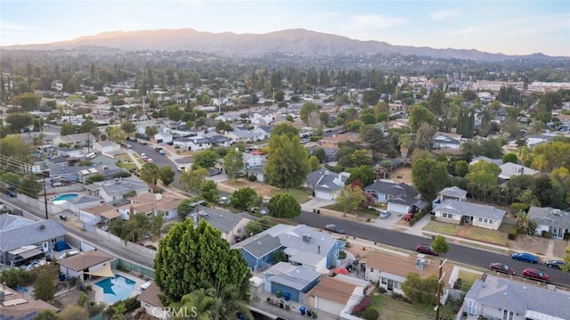 16908 Los Alimos St, Granada Hills, CA 91344 - aerial view of residential area with a mountainous background