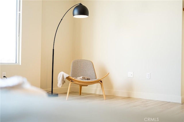 435 W Center St Promenade, Unit 401, Anaheim, CA 92805 - sitting room featuring baseboards and wood finished floors