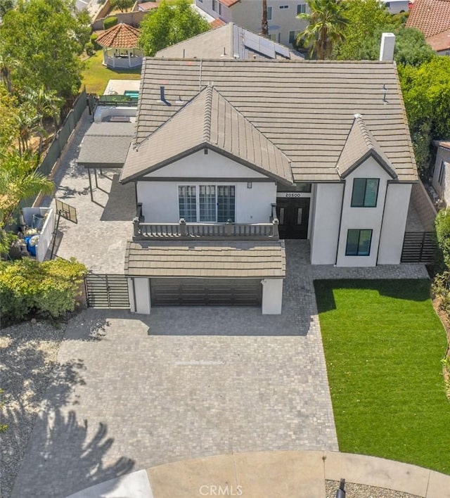 20500 Blairmoore St, Chatsworth, CA 91311 - view of front facade featuring stucco siding, driveway, and an attached garage