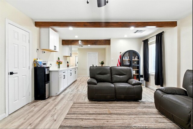 29246 Radio Rd, Barstow, CA 92311 - living room with beam ceiling, light wood-style floors, and recessed lighting