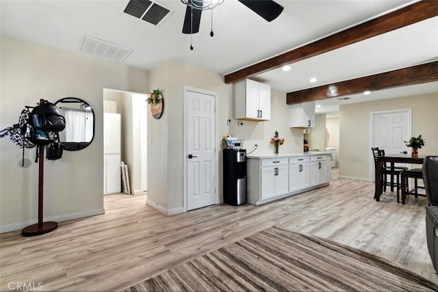 29246 Radio Rd, Barstow, CA 92311 - kitchen featuring light wood-style floors, a ceiling fan, recessed lighting, white cabinets, and light countertops