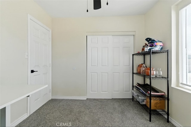29246 Radio Rd, Barstow, CA 92311 - carpeted bedroom featuring a closet and ceiling fan