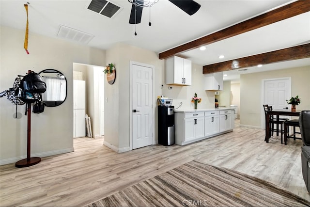 29246 Radio Rd, Barstow, CA 92311 - kitchen featuring light wood-style floors, ceiling fan, recessed lighting, white cabinets, and light countertops