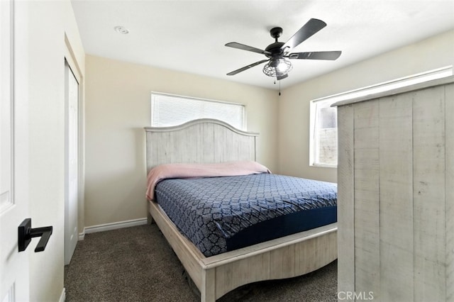 29246 Radio Rd, Barstow, CA 92311 - carpeted bedroom with baseboards and ceiling fan