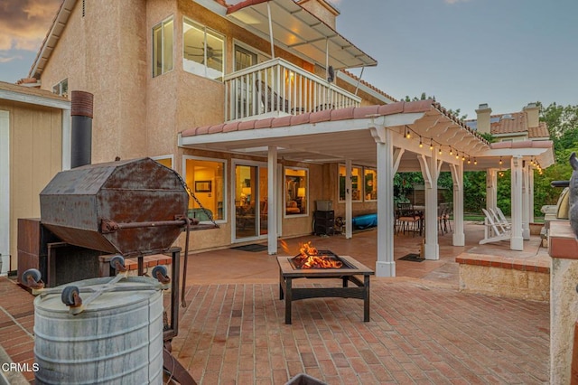 4665 Northridge Dr, Palmdale, CA 93551 - patio / terrace featuring a fire pit, a patio area, and a pergola