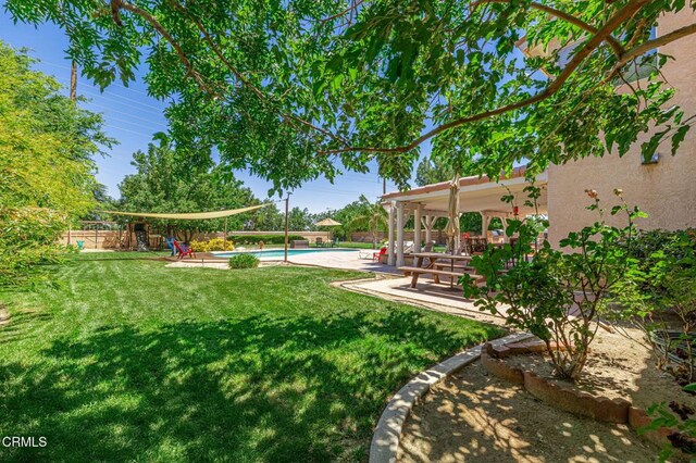 4665 Northridge Dr, Palmdale, CA 93551 - fenced backyard with a patio