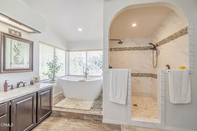 4665 Northridge Dr, Palmdale, CA 93551 - bathroom featuring a freestanding bath, vanity, a walk in shower, and recessed lighting