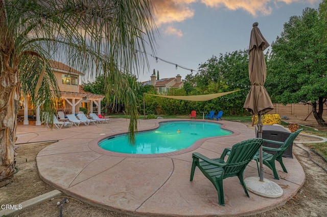 4665 Northridge Dr, Palmdale, CA 93551 - pool at dusk with a patio