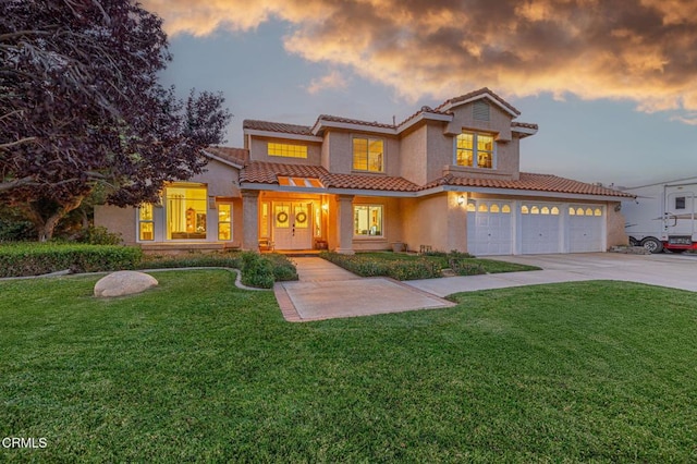 4665 Northridge Dr, Palmdale, CA 93551 - mediterranean / spanish-style home featuring a tiled roof, stucco siding, concrete driveway, and a yard