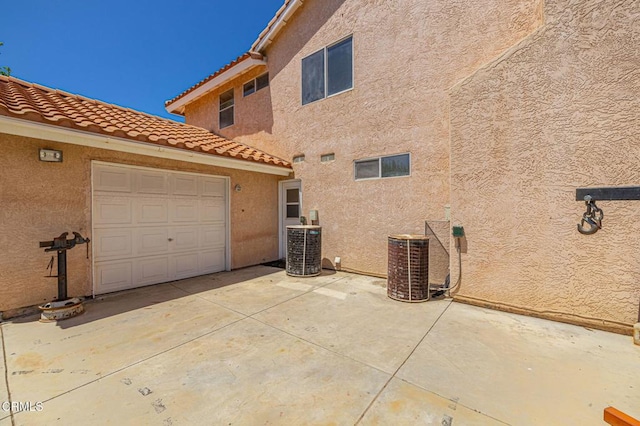 4665 Northridge Dr, Palmdale, CA 93551 - back of house featuring stucco siding and a tile roof